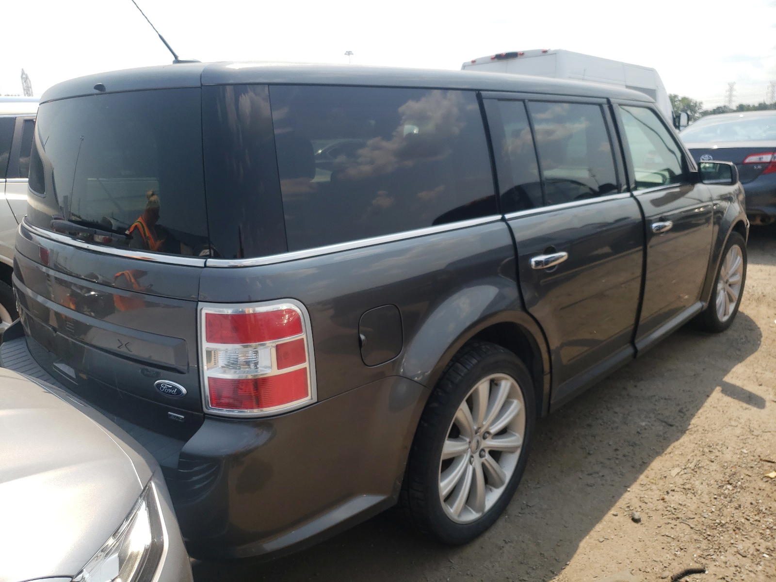 Photo 4 from auction – 2016 FORD FLEX with VIN 2FMHK6C88GBA11432
