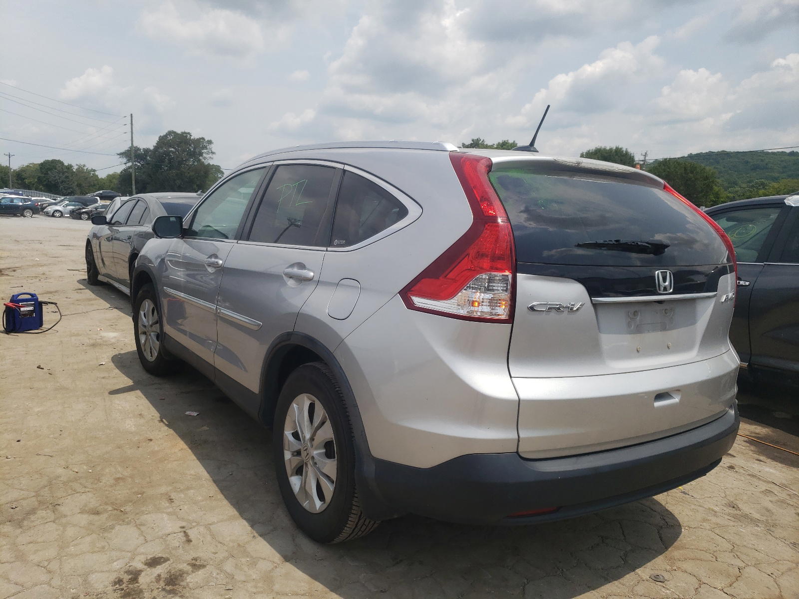 Photo 3 from auction – 2012 HONDA CR-V EXL with VIN 5J6RM4H75CL015269