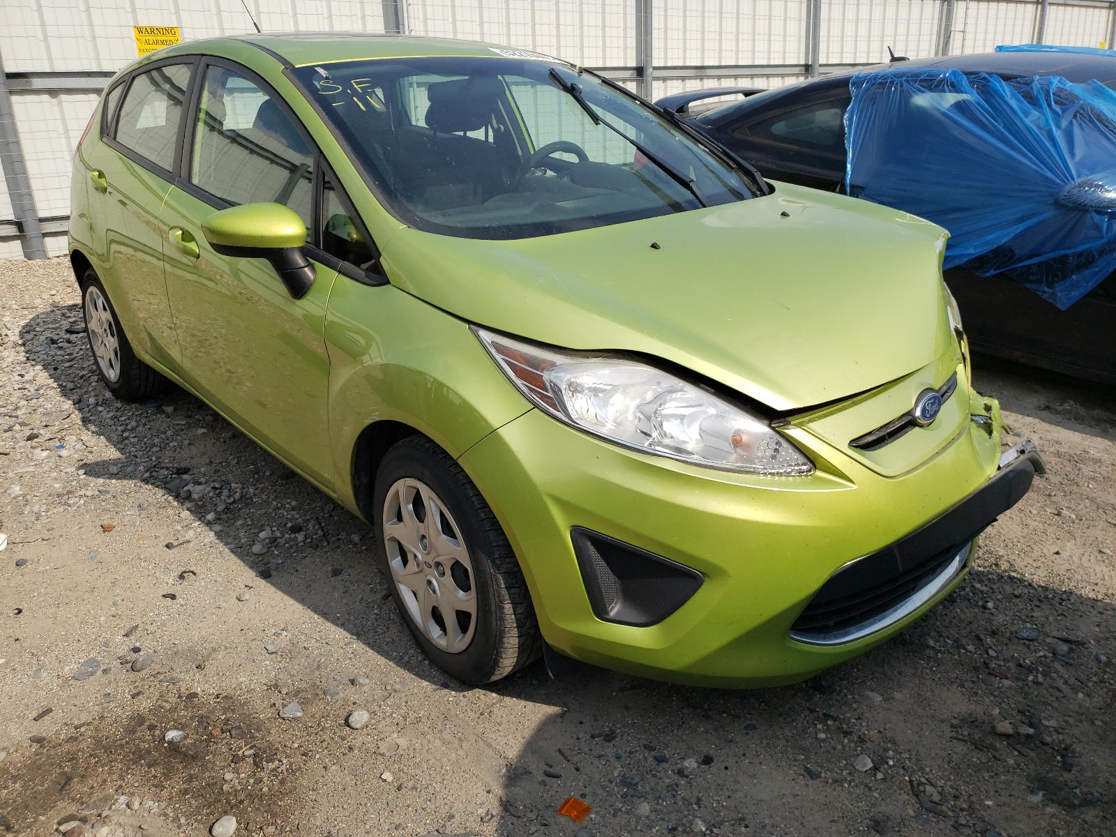 FORD FIESTA SE 2011 with VIN 3FADP4EJ7BM156600 - Photo from auction