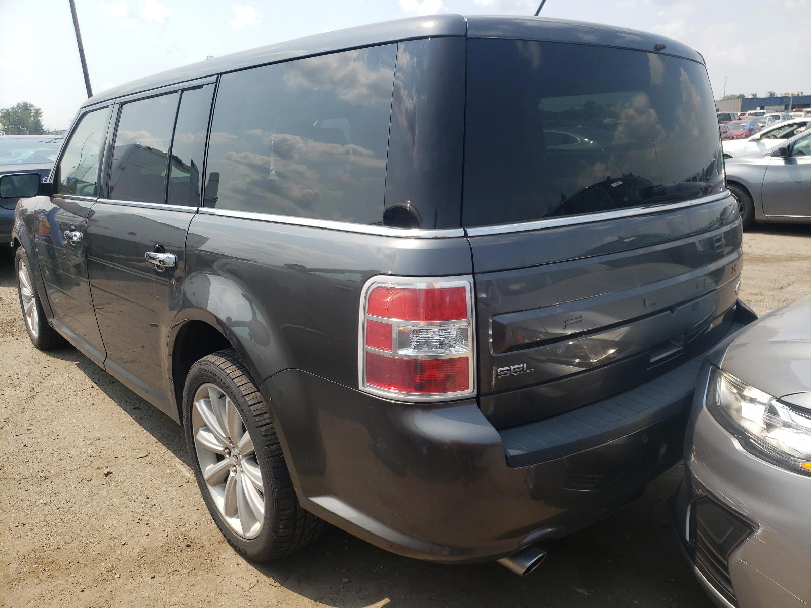 Photo 3 from auction – 2016 FORD FLEX with VIN 2FMHK6C88GBA11432
