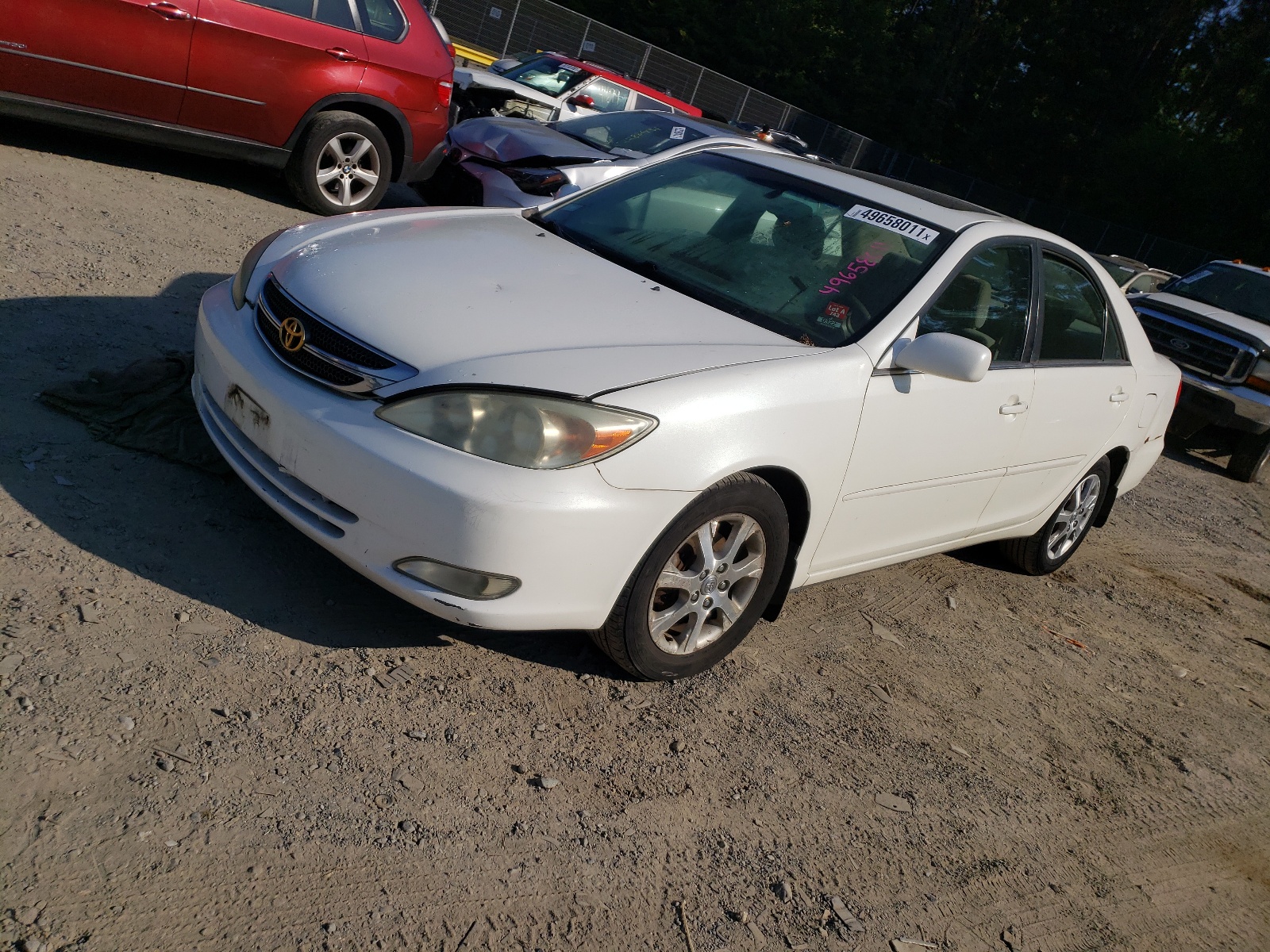 Photo 2 from auction – 2004 TOYOTA CAMRY LE with VIN JTDBE30K940254731