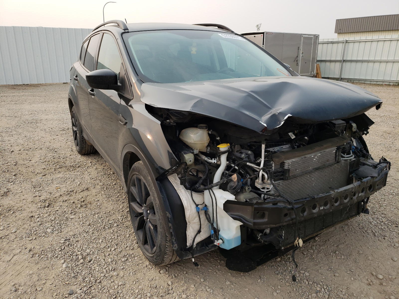 FORD ESCAPE SE 2018 with VIN 1FMCU9GD8JUA85576 - Photo from auction