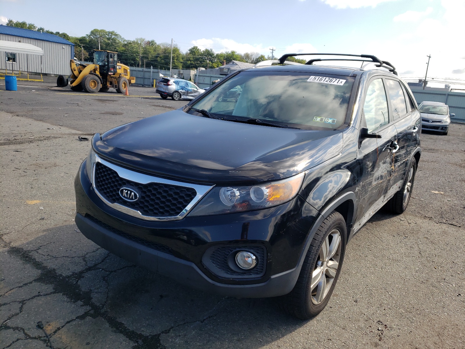Photo 2 from auction – 2013 KIA SORENTO EX with VIN 5XYKUDA24DG325108