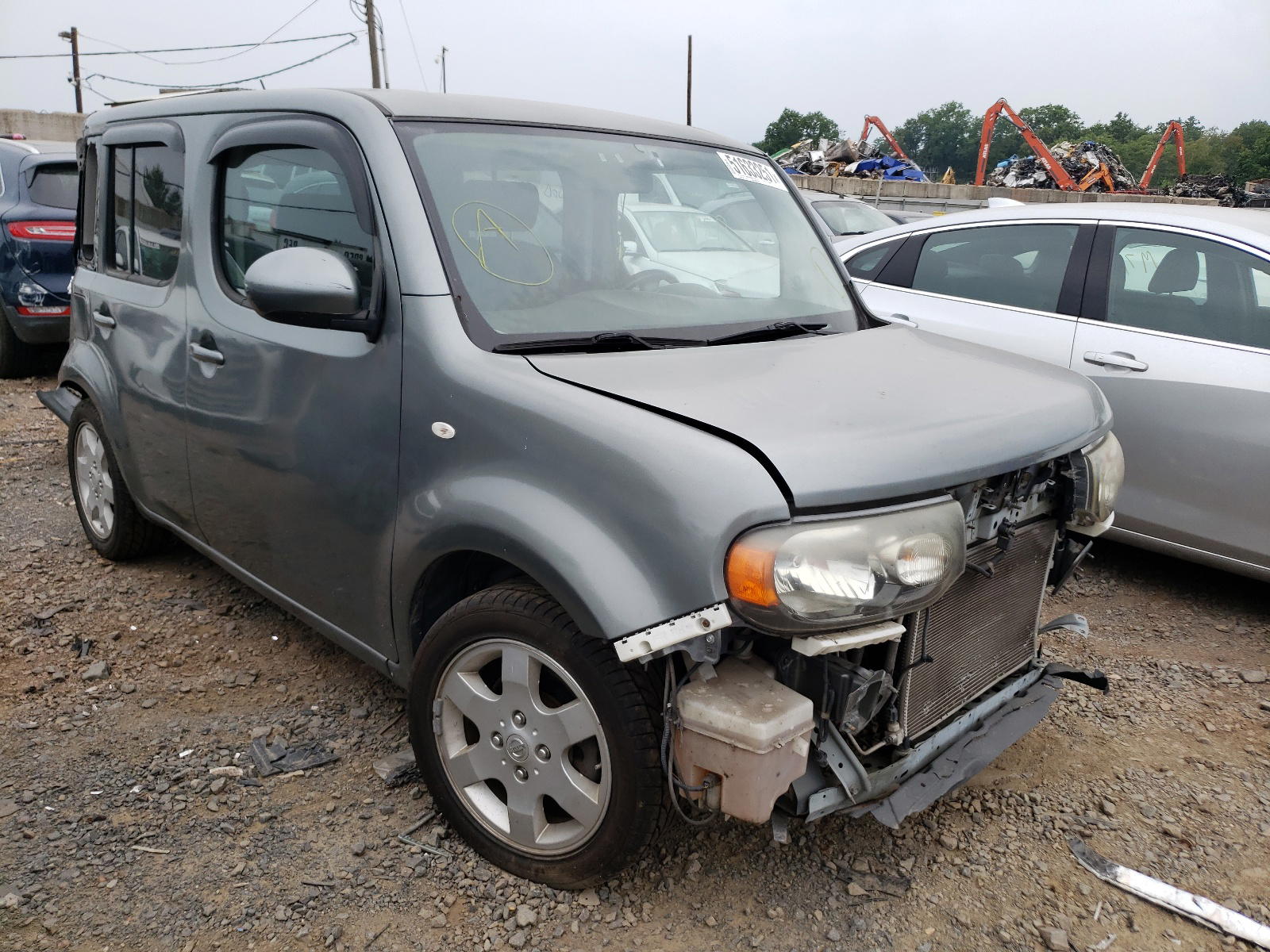 NISSAN CUBE BASE 2011 with VIN JN8AZ2KR6BT204311 - Photo from auction