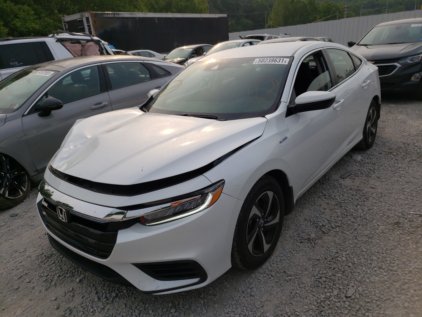 Photo 2 from auction – 2021 HONDA INSIGHT EX with VIN 19XZE4F52ME010111