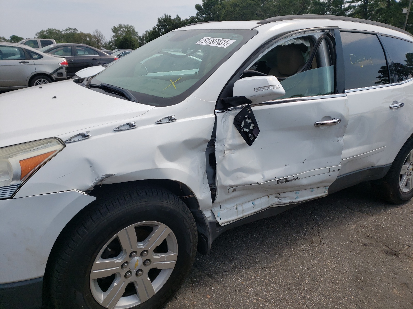 Photo 9 from auction – 2010 CHEVROLET TRAVERSE L with VIN 1GNLRGED9AS115460