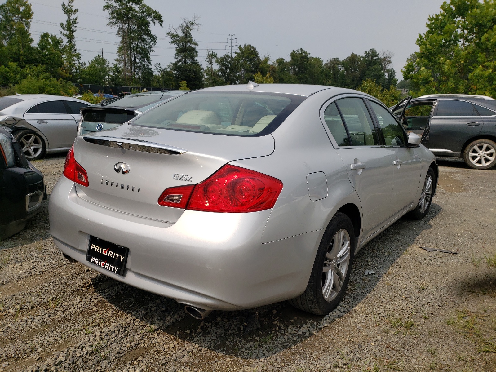 Photo 4 from auction – 2011 INFINITI G25 with VIN JN1DV6ARXBM651802