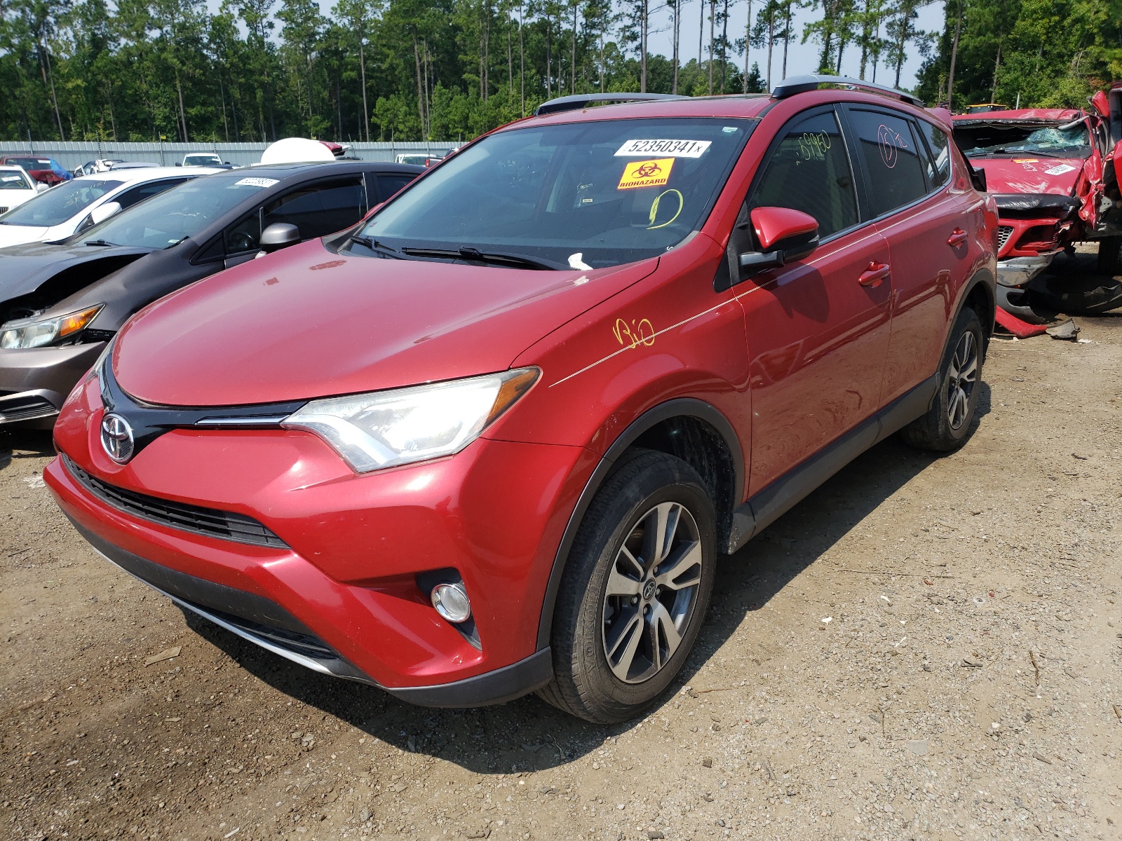 Photo 2 from auction – 2016 TOYOTA RAV4 XLE with VIN JTMWFREV4GJ075838