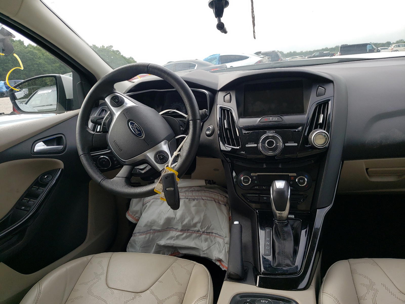Photo 9 from auction – 2014 FORD FOCUS BEV with VIN 1FADP3R4XEL353300