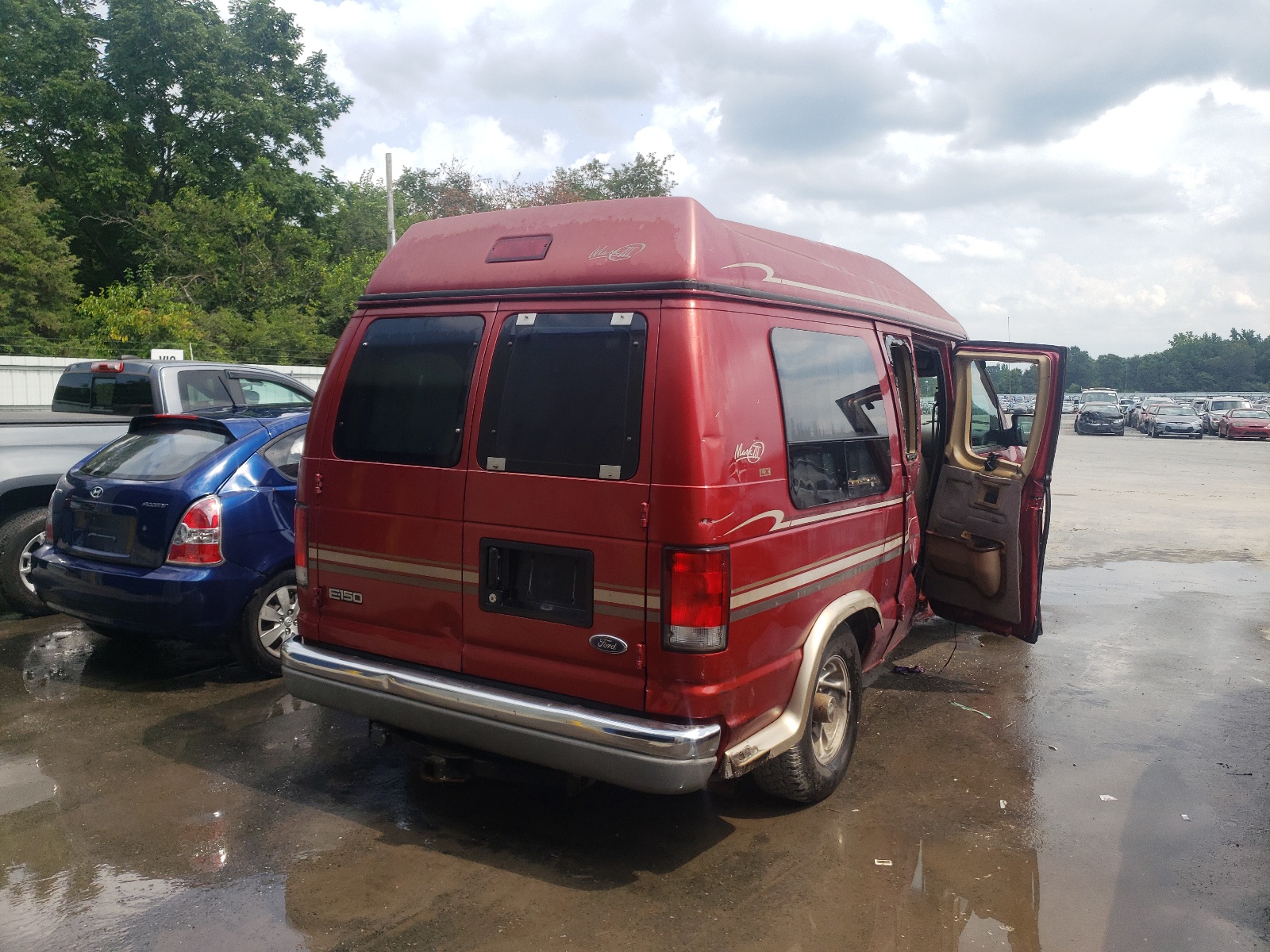 Photo 4 from auction – 1999 FORD ECONOLINE with VIN 1FDRE14L0XHC10642
