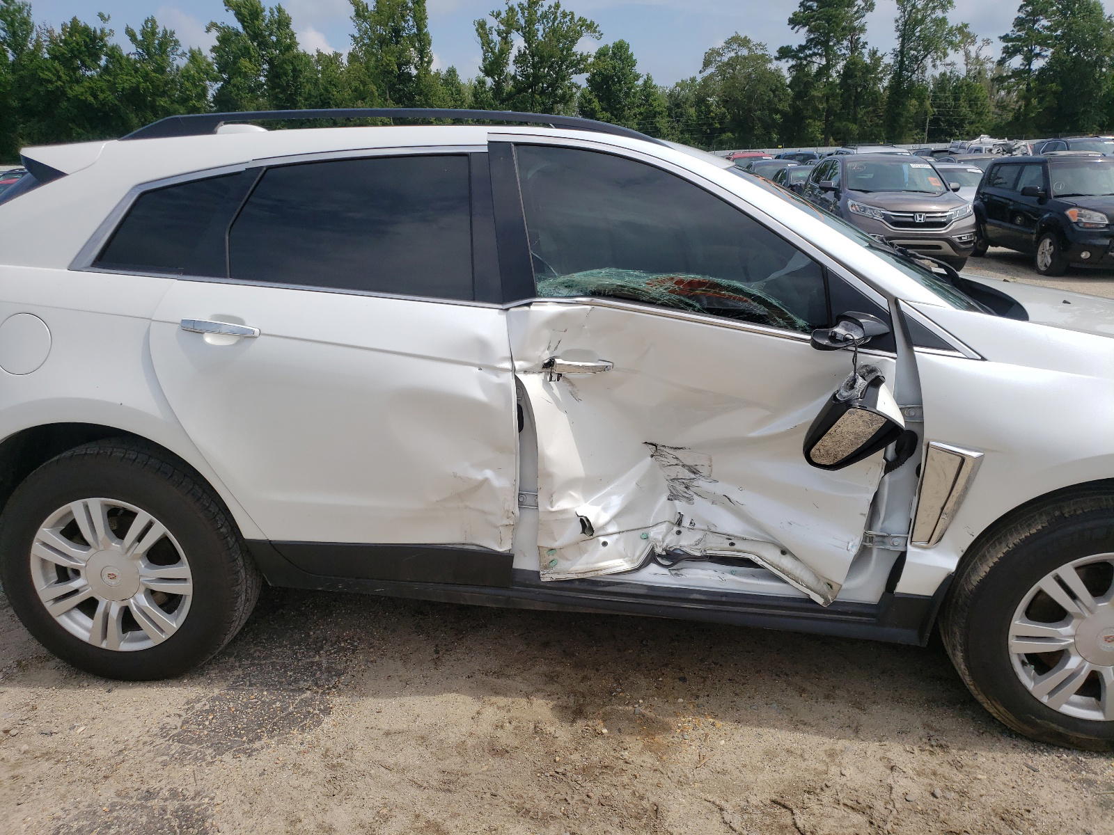 Photo 9 from auction – 2015 CADILLAC SRX with VIN 3GYFNAE3XFS539628