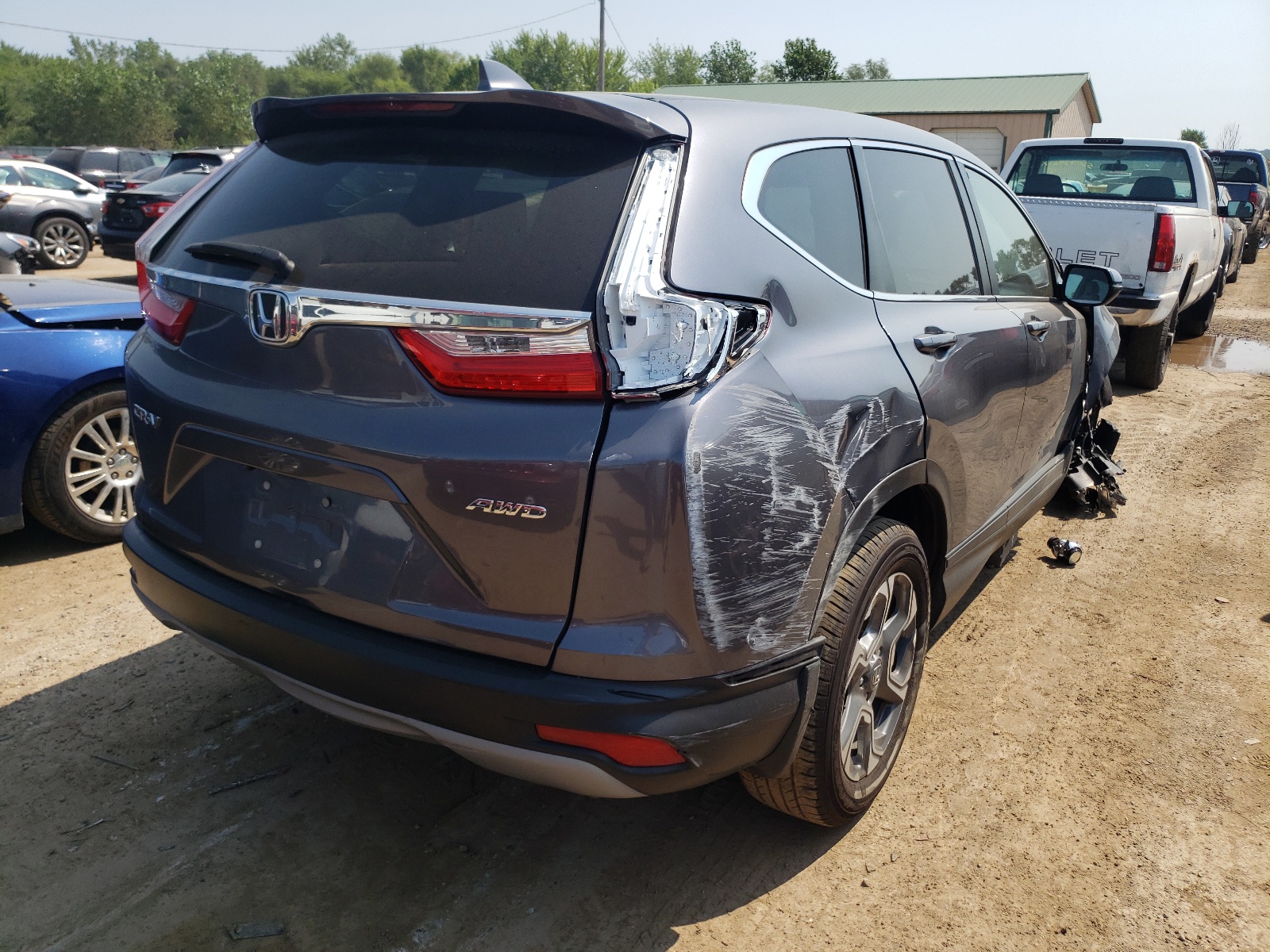 Photo 4 from auction – 2017 HONDA CR-V EXL with VIN 5J6RW2H87HL044304