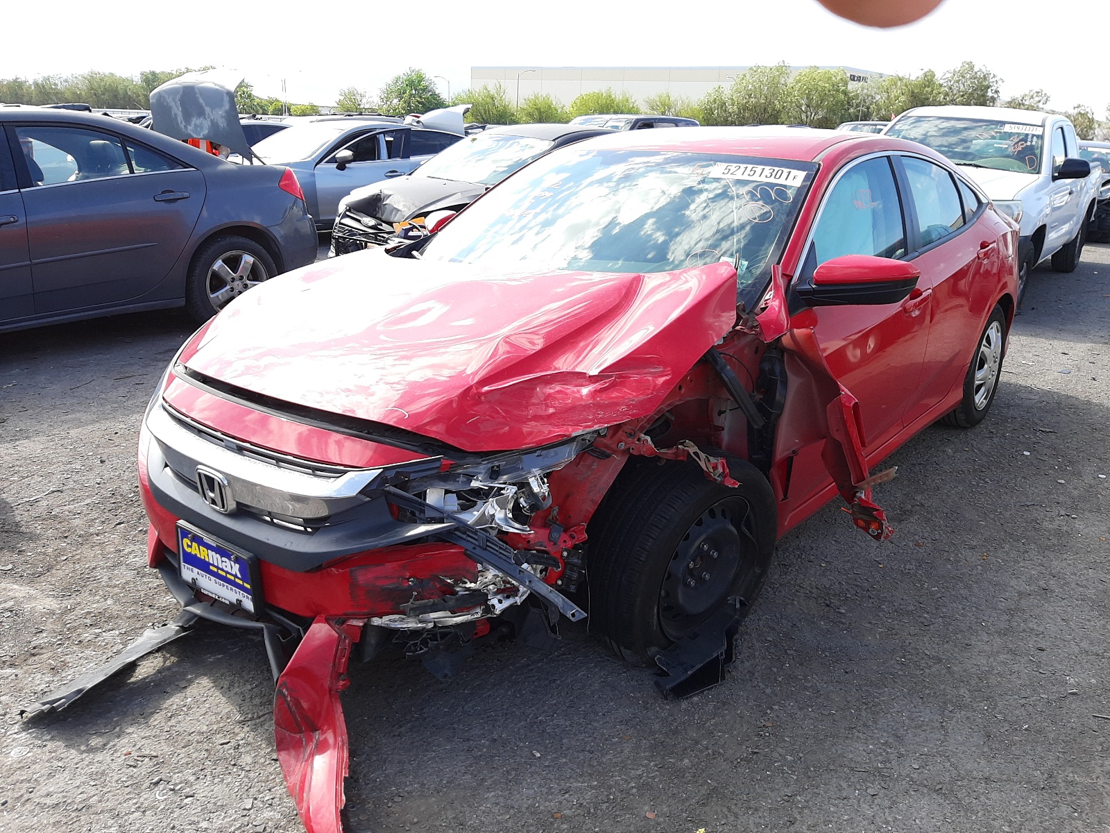 Photo 2 from auction – 2016 HONDA CIVIC LX with VIN 2HGFC2F52GH541770