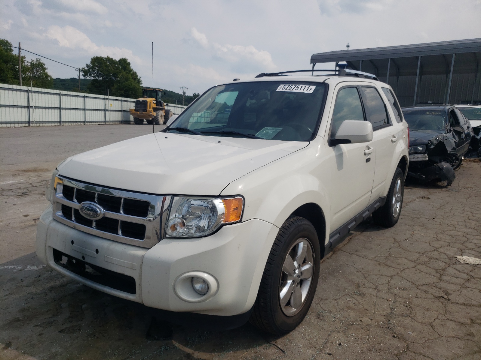 Photo 2 from auction – 2009 FORD ESCAPE LIM with VIN 1FMCU94G29KA05050