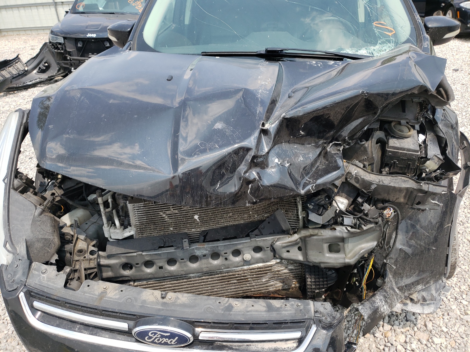 Photo 7 from auction – 2015 FORD ESCAPE TIT with VIN 1FMCU0J92FUA20214