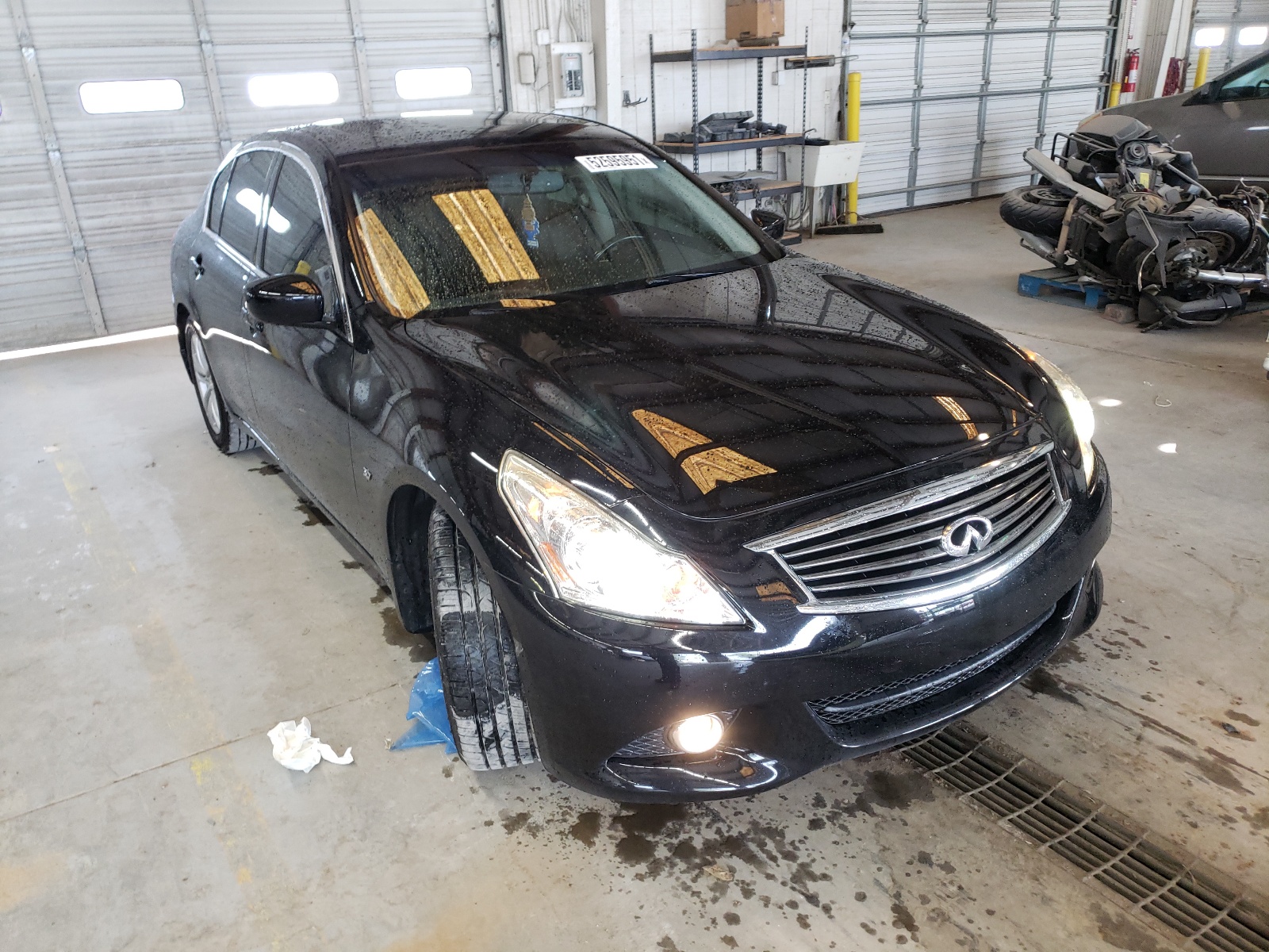 INFINITI Q40 2015 with VIN JN1CV6AP3FM502213 - Photo from auction