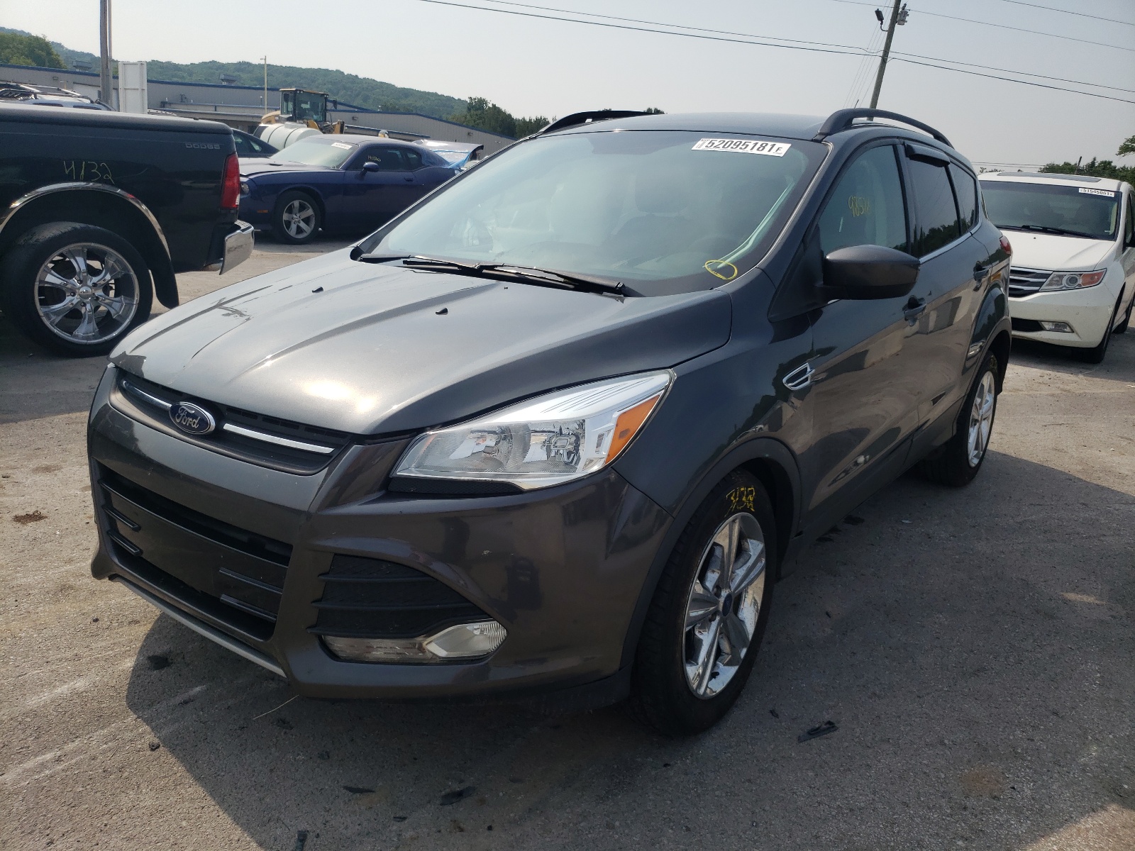 Photo 2 from auction – 2016 FORD ESCAPE SE with VIN 1FMCU9G95GUB18070