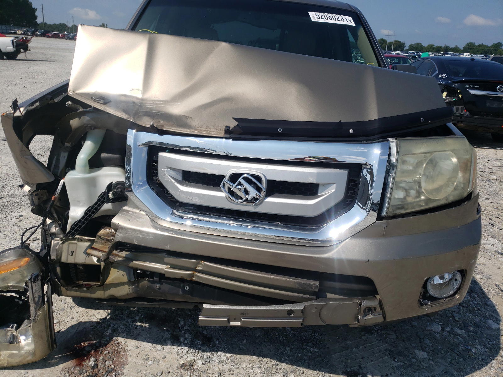 Photo 7 from auction – 2011 HONDA PILOT EXL with VIN 5FNYF3H6XBB038836