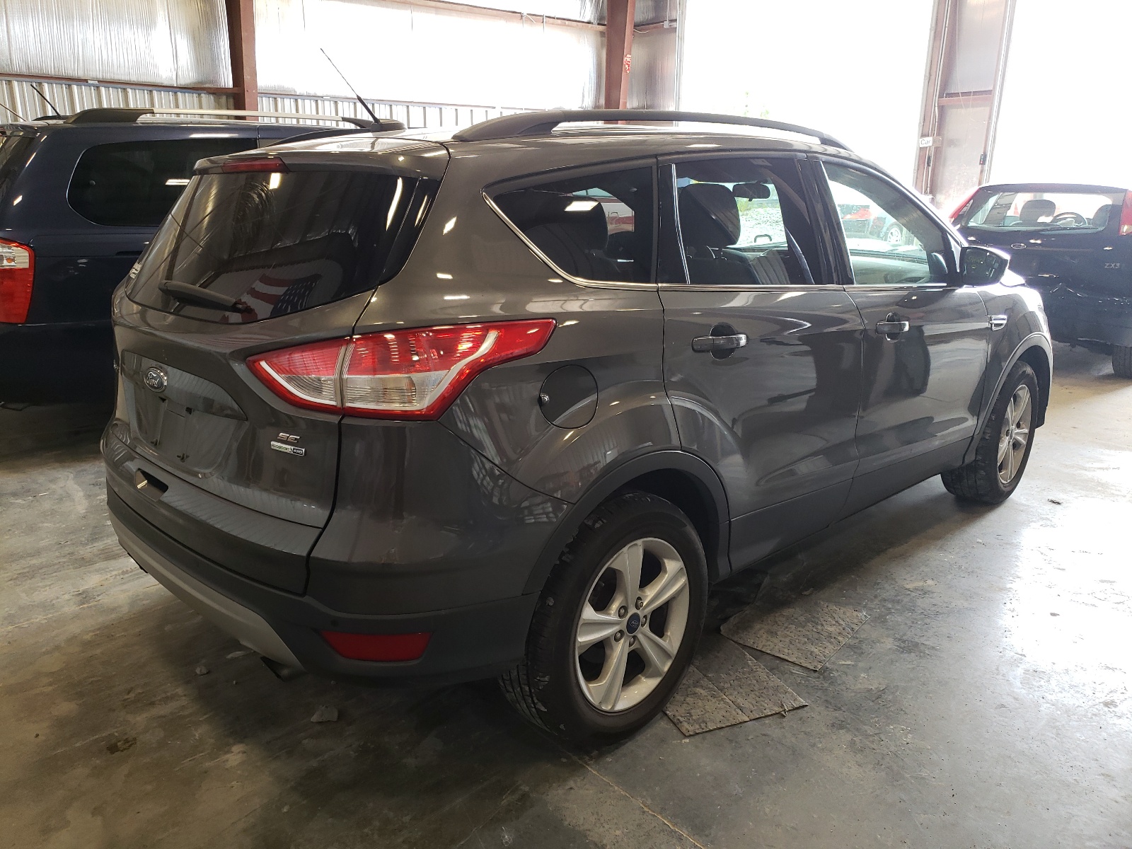 Photo 4 from auction – 2015 FORD ESCAPE SE with VIN 1FMCU9GX1FUC57187