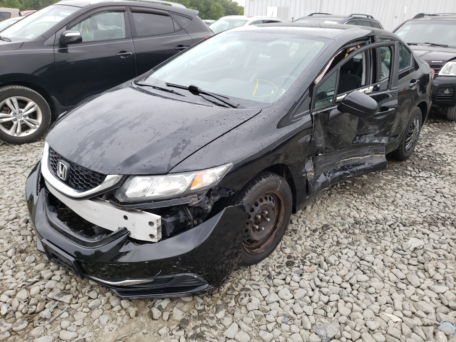 Photo 2 from auction – 2014 HONDA CIVIC LX with VIN 2HGFB2F50EH555361