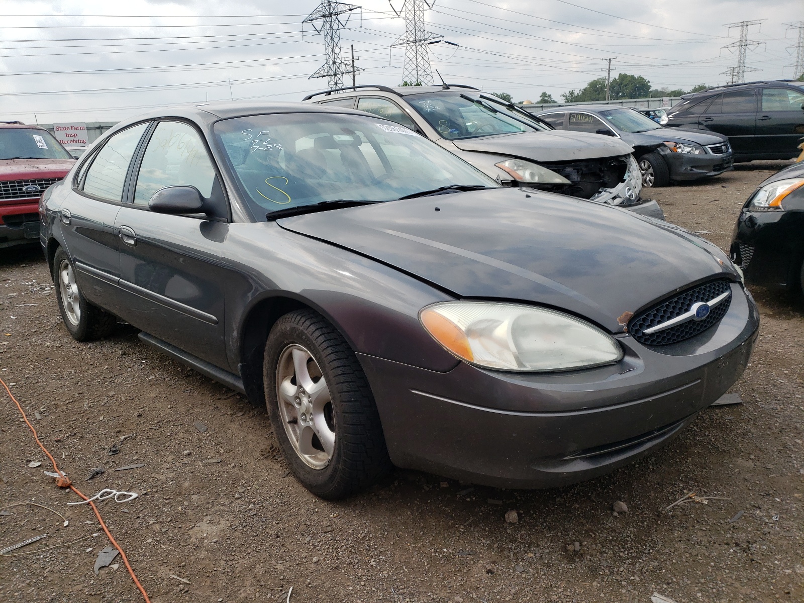 FORD TAURUS SE 2002 с VIN 1FAFP53U62G166850 - Фото с аукциона