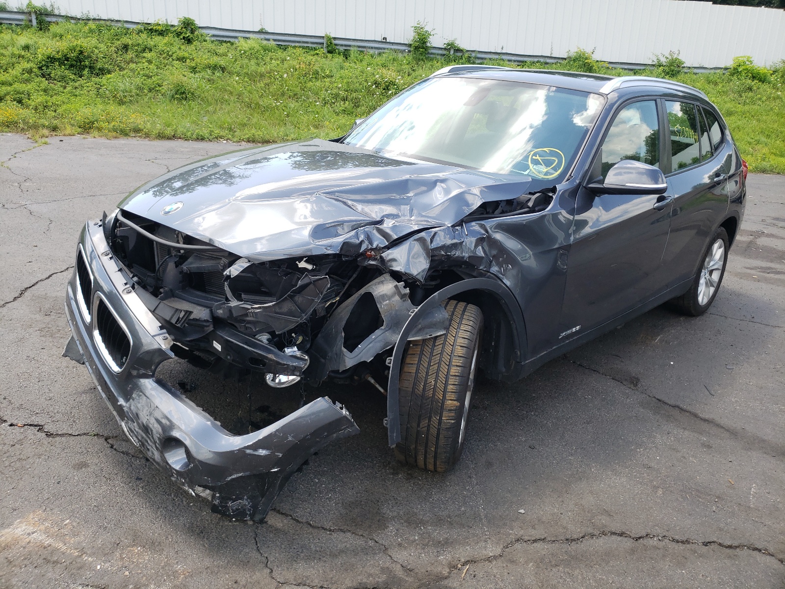 Photo 2 from auction – 2014 BMW X1 XDRIVE2 with VIN WBAVL1C53EVY20980