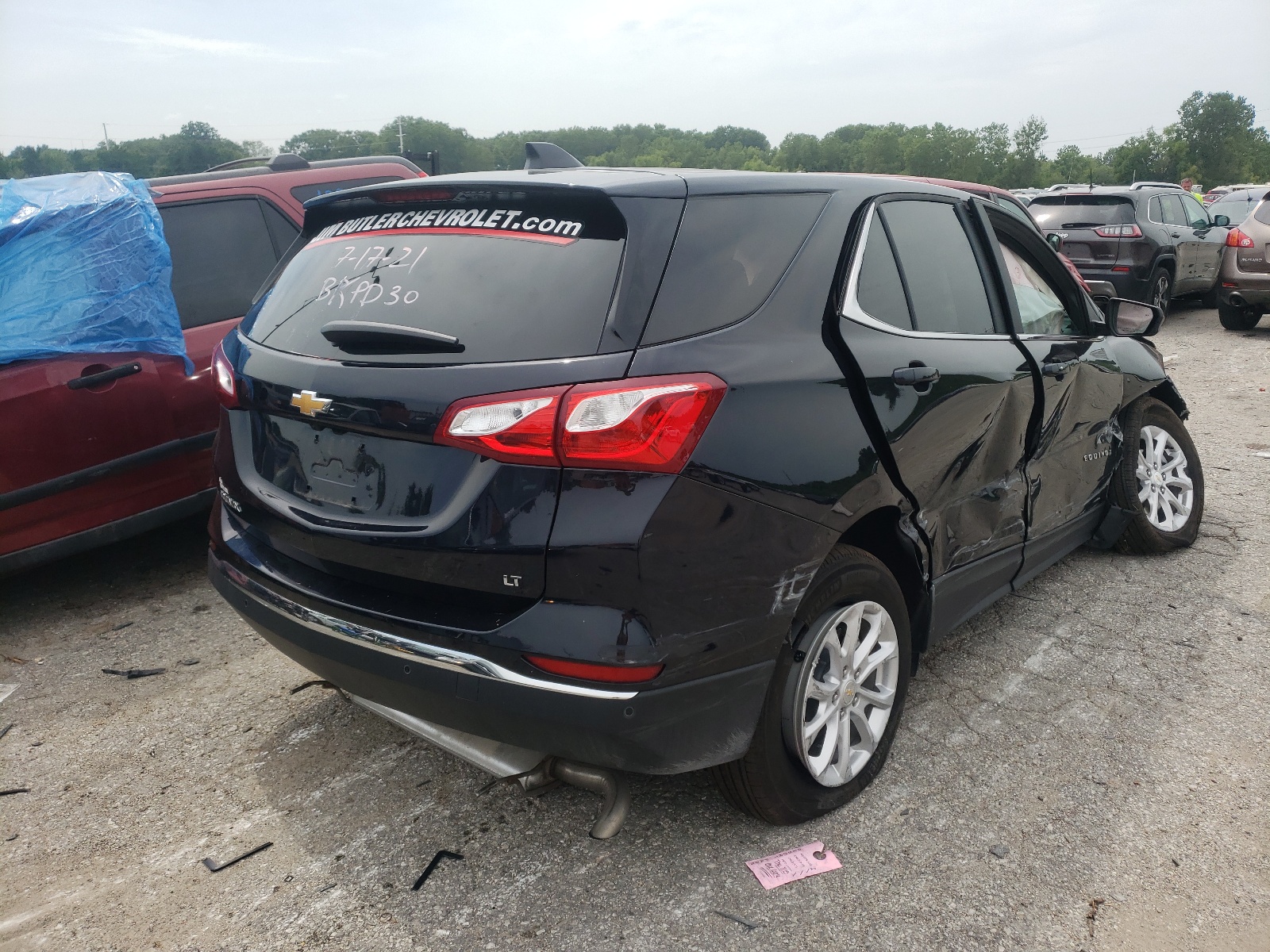Photo 4 from auction – 2021 CHEVROLET EQUINOX LT with VIN 3GNAXKEV9MS142840
