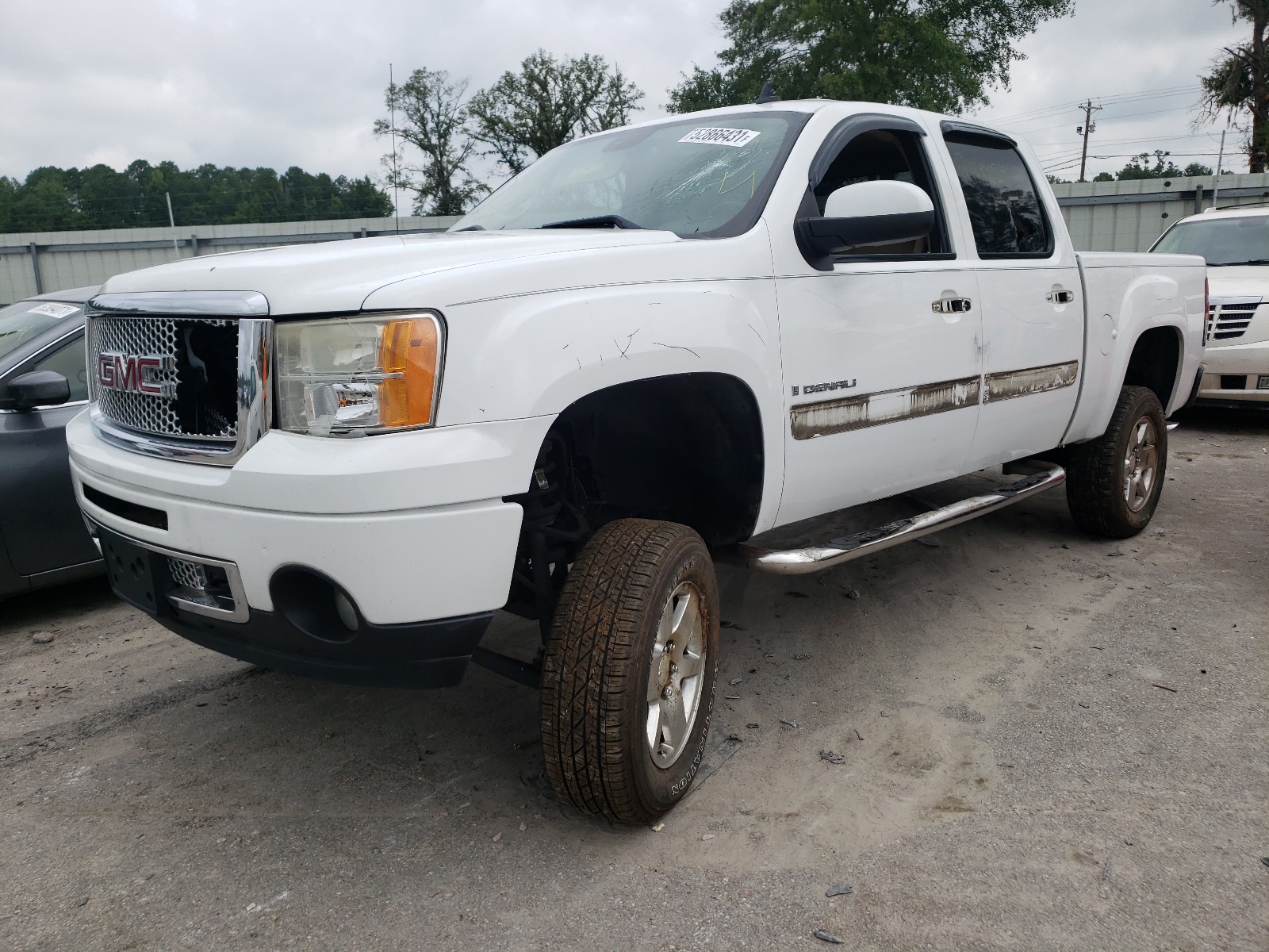 Photo 2 from auction – 2009 GMC SIERRA K15 with VIN 3GTEK03249G155897