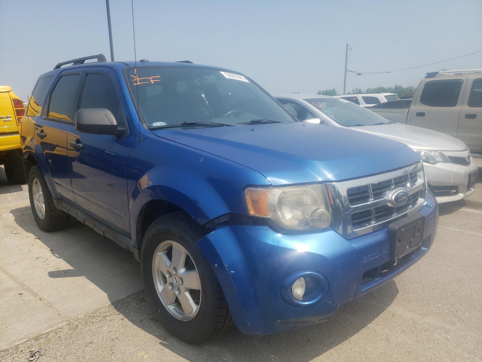 FORD ESCAPE XLT 2011 with VIN 1FMCU0D70BKA05856 - Photo from auction
