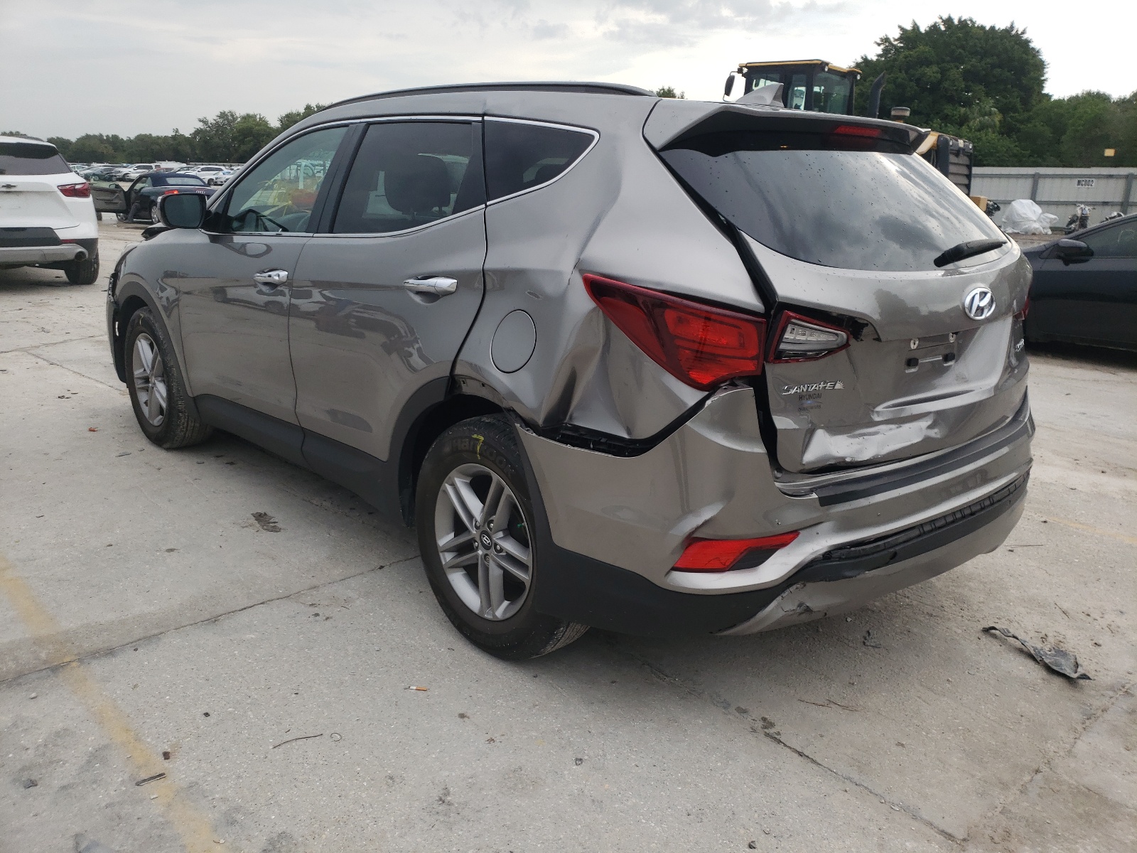 Photo 3 from auction – 2017 HYUNDAI SANTA FE S with VIN 5NMZU3LB6HH041657