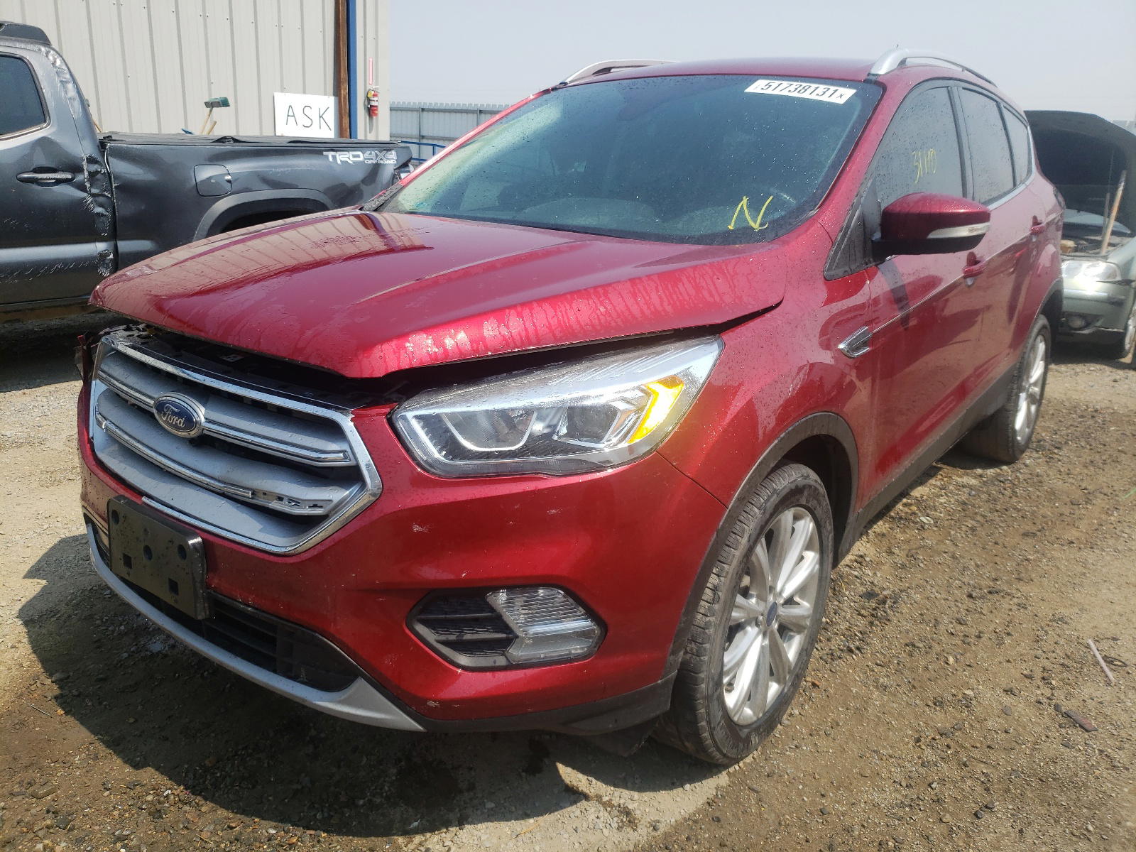 Photo 2 from auction – 2017 FORD ESCAPE TIT with VIN 1FMCU0J99HUD12347