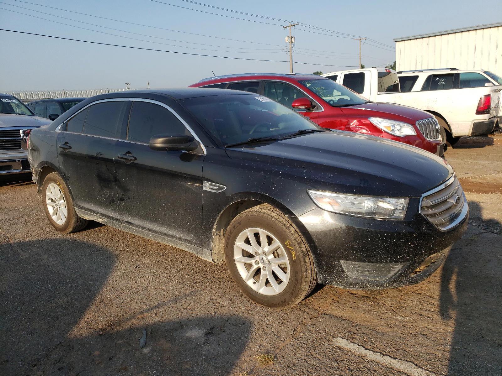 FORD TAURUS SE 2013 with VIN 1FAHP2D85DG123225 - Photo from auction