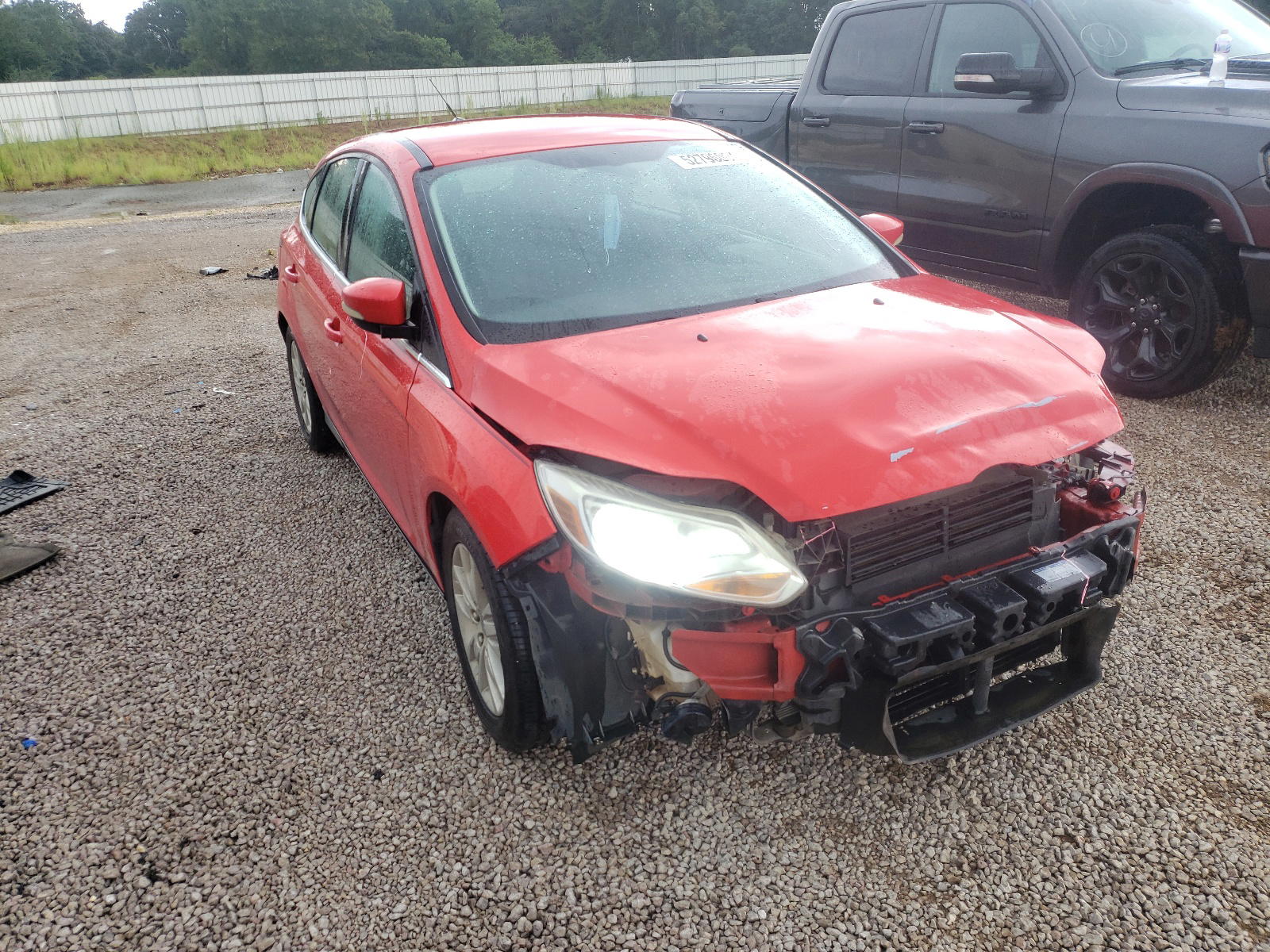 FORD FOCUS SEL 2012 with VIN 1FAHP3M2XCL333519 - Photo from auction