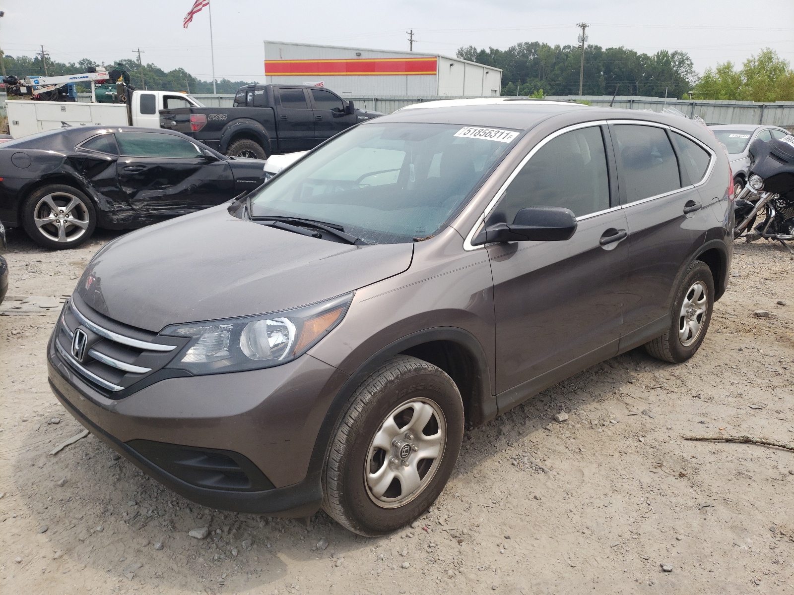 Photo 2 from auction – 2014 HONDA CR-V LX with VIN 2HKRM3H33EH518318