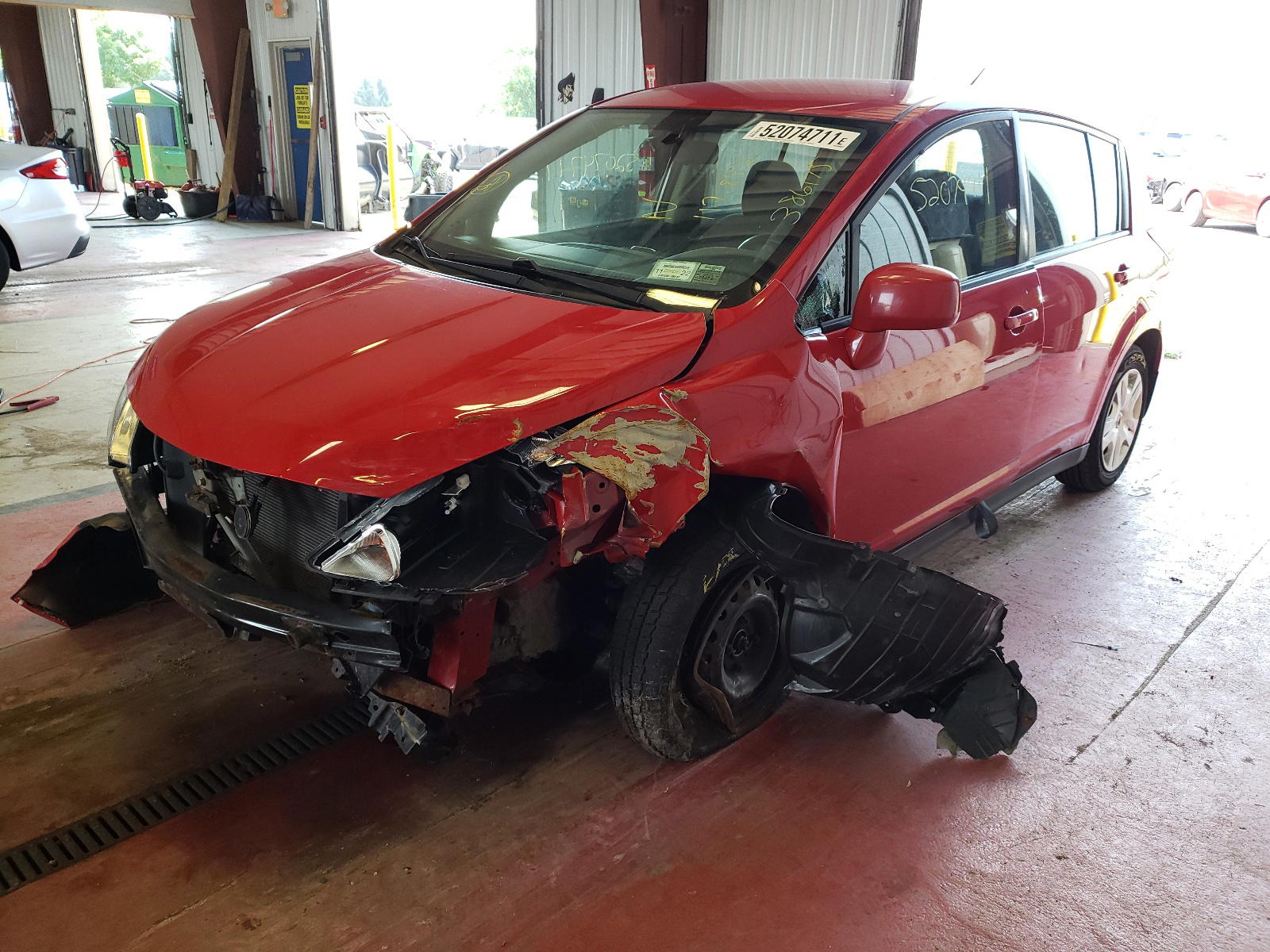 Photo 2 from auction – 2011 NISSAN VERSA S with VIN 3N1BC1CP1BL386175