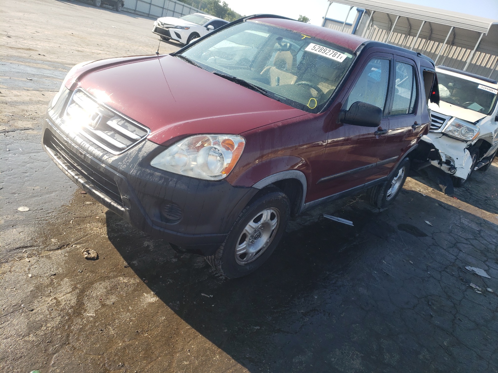 Photo 2 from auction – 2005 HONDA CR-V LX with VIN JHLRD685X5C020084