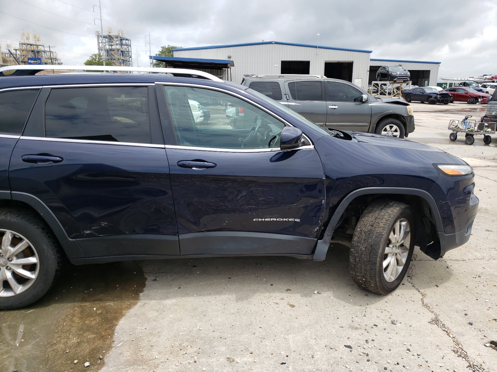 Photo 9 from auction – 2014 JEEP CHEROKEE L with VIN 1C4PJMDB5EW157039