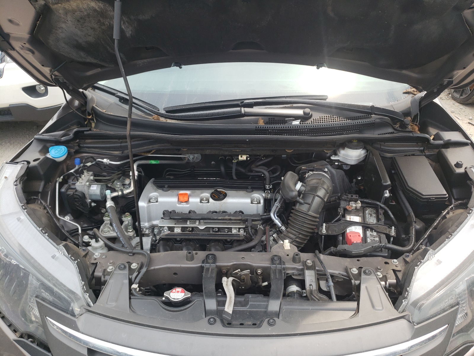Photo 7 from auction – 2014 HONDA CR-V LX with VIN 2HKRM3H33EH518318