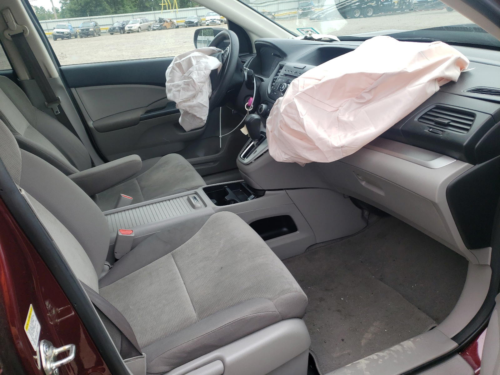 Photo 5 from auction – 2012 HONDA CR-V LX with VIN 5J6RM4H30CL061007