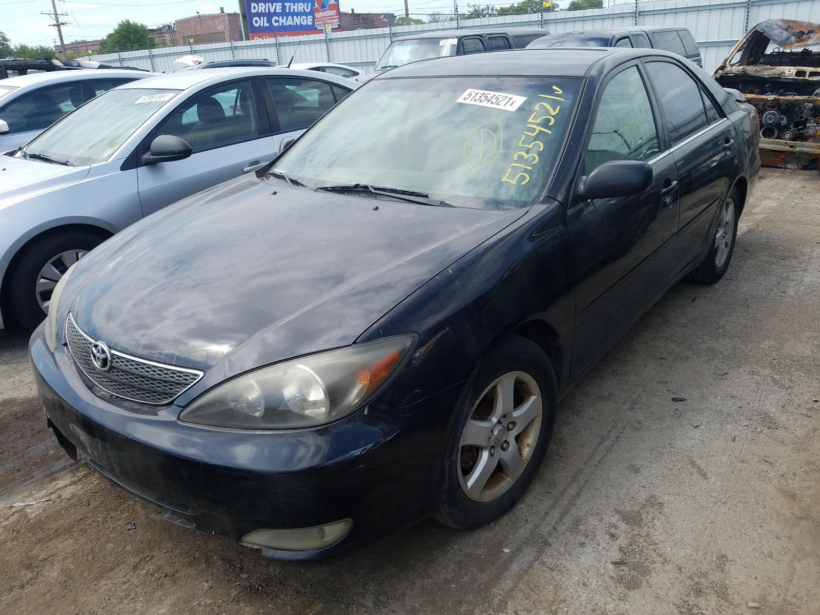 Photo 2 from auction – 2002 TOYOTA CAMRY LE with VIN JTDBF30K020039202