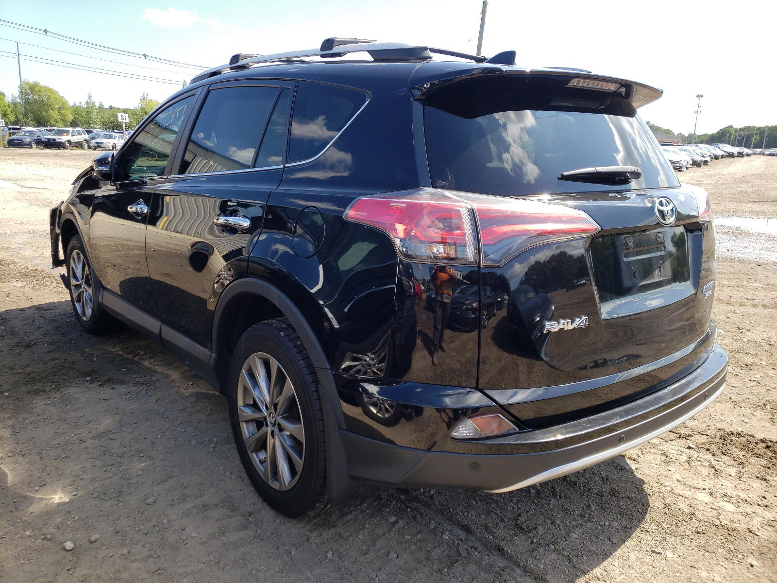 Photo 3 from auction – 2016 TOYOTA RAV4 LIMIT with VIN 2T3DFREV3GW472627