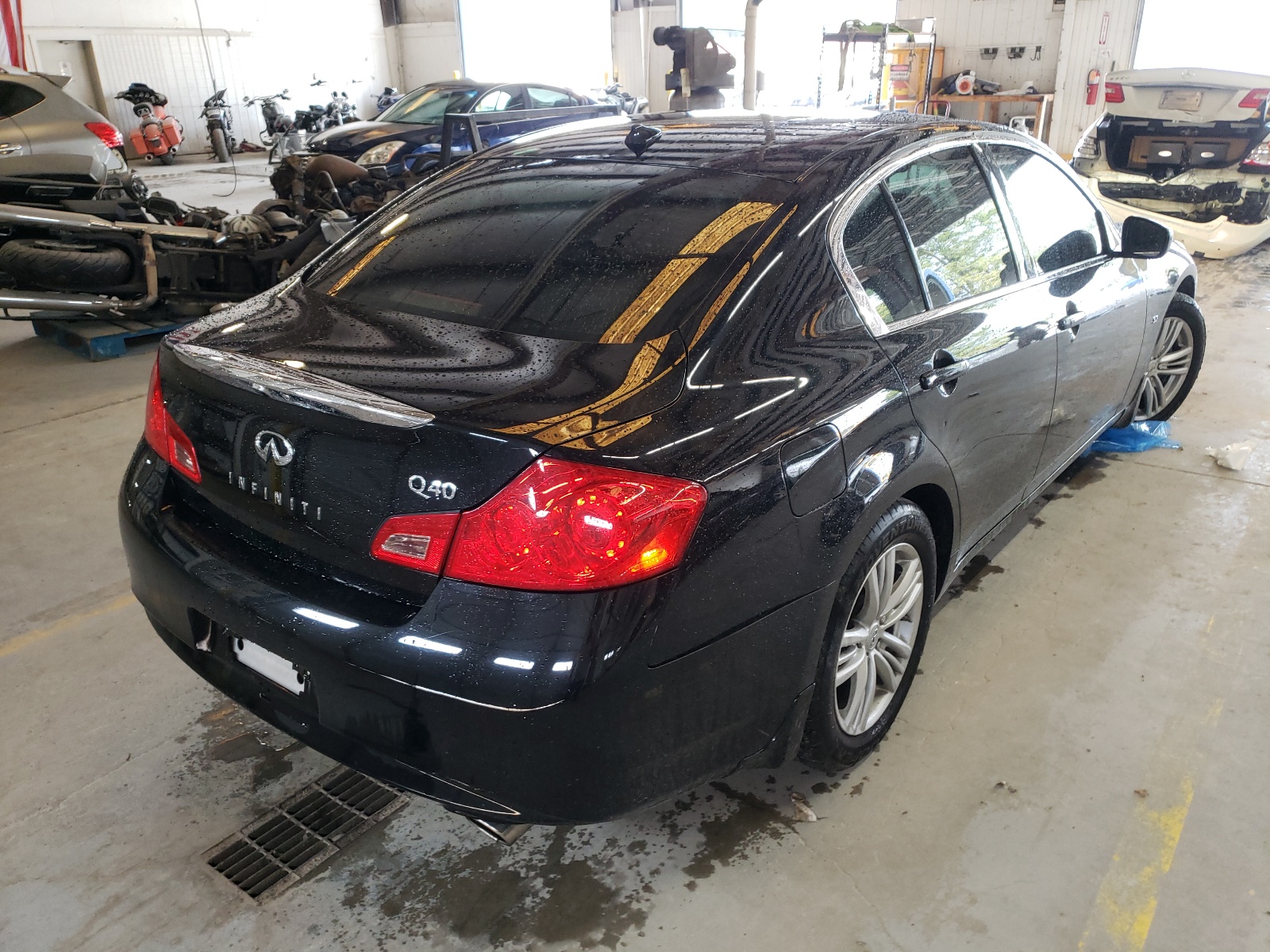 Photo 4 from auction – 2015 INFINITI Q40 with VIN JN1CV6AP3FM502213