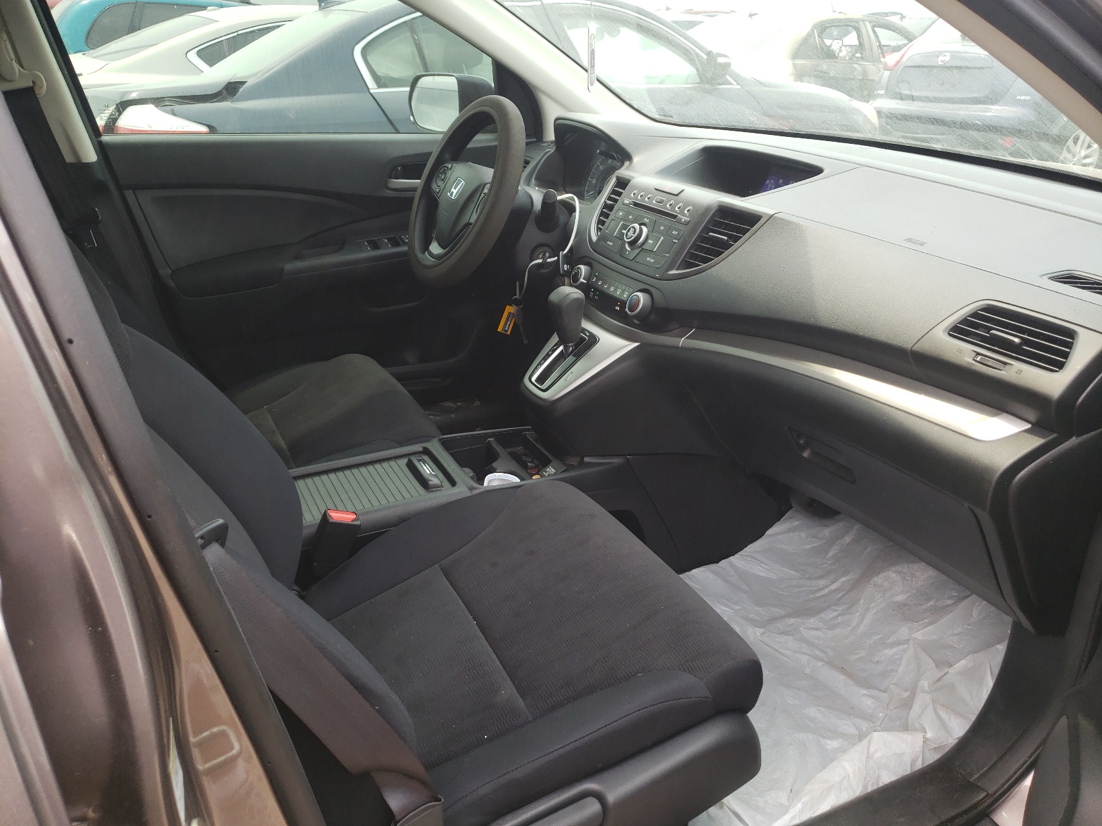 Photo 5 from auction – 2014 HONDA CR-V LX with VIN 2HKRM3H33EH518318