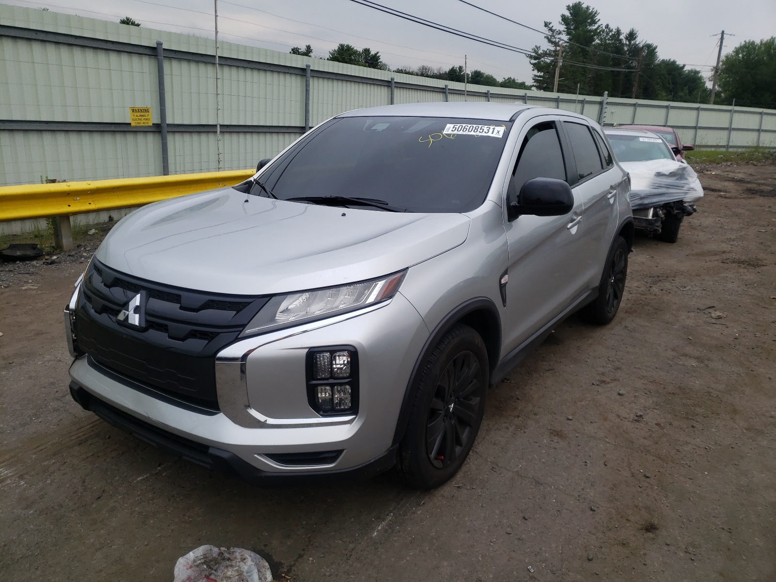 Photo 2 from auction – 2021 MITSUBISHI OUTLANDER with VIN JA4APUAU4MU003582