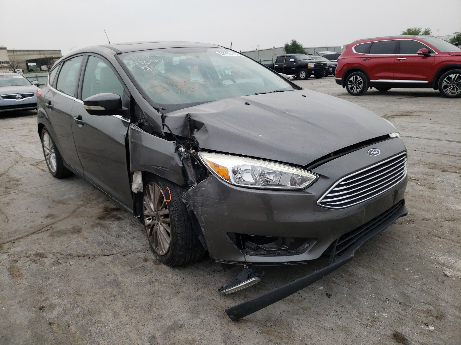 FORD FOCUS TITA 2016 with VIN 1FADP3N23GL208798 - Photo from auction