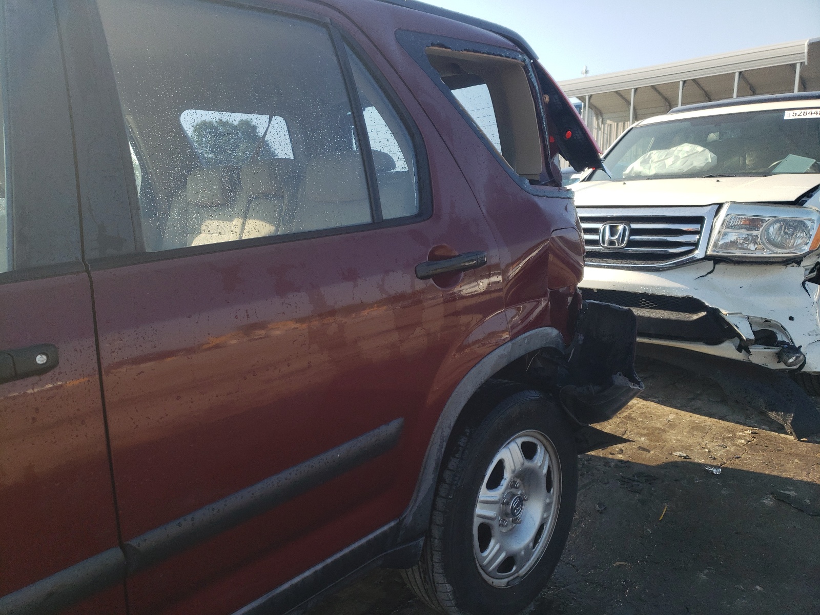 Photo 9 from auction – 2005 HONDA CR-V LX with VIN JHLRD685X5C020084