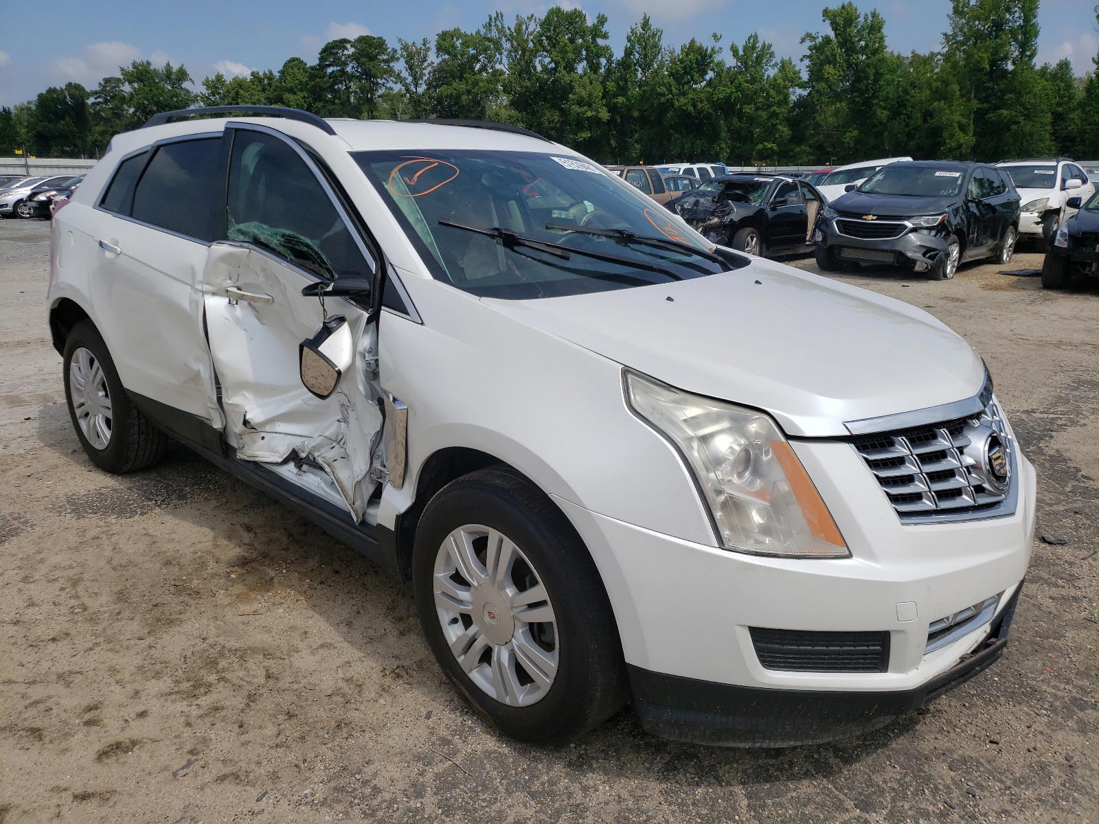 CADILLAC SRX 2015 with VIN 3GYFNAE3XFS539628 - Photo from auction