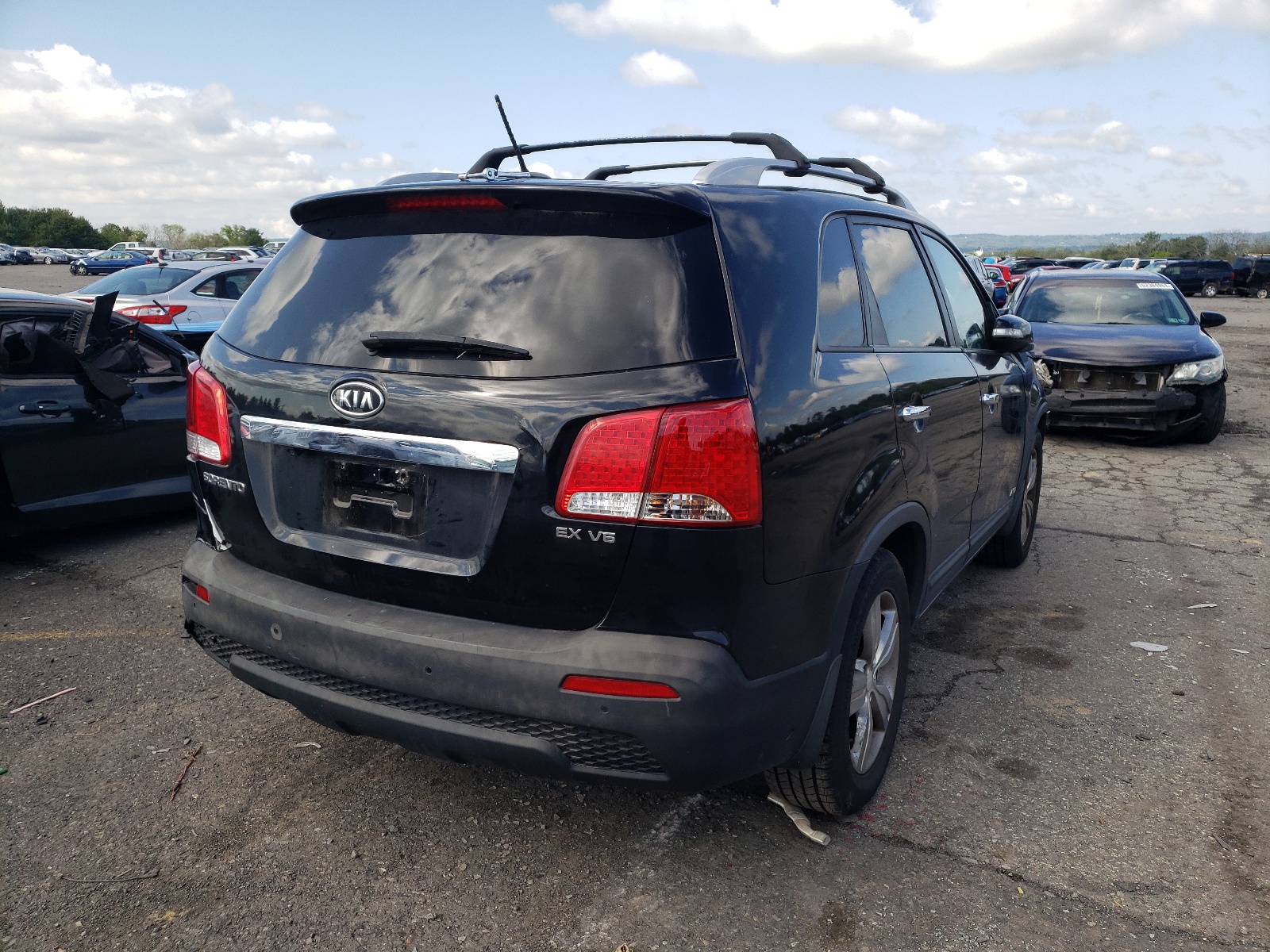 Photo 4 from auction – 2013 KIA SORENTO EX with VIN 5XYKUDA24DG325108