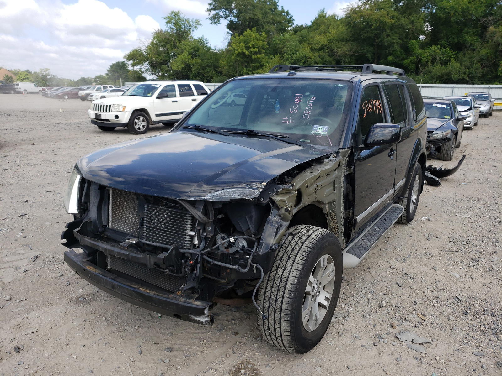 Photo 2 from auction – 2012 NISSAN PATHFINDER with VIN 5N1AR1NB0CC636751
