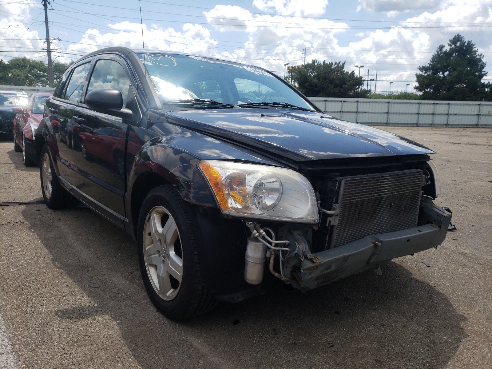 DODGE CALIBER SX 2009 مع رقم تعريف المركبة 1B3HB48A29D259579 - صورة من المزاد
